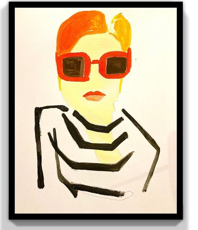 "Redhead with red glasses"